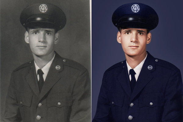 people holding umbrellas on a busy street at night lit by street lights and illuminated signs in Tokyo, Japan