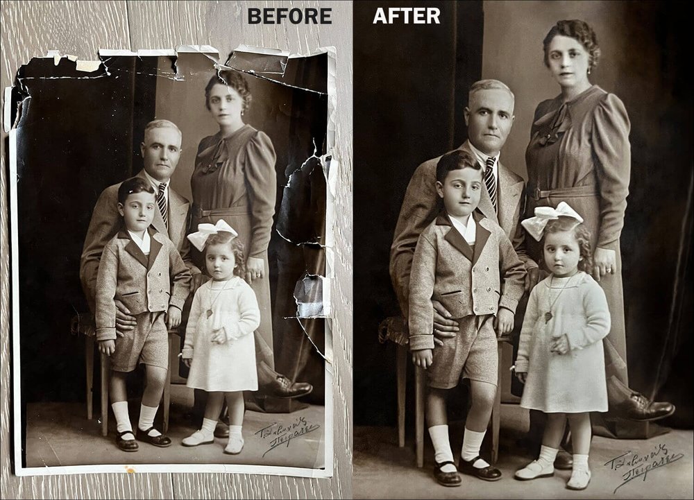 man wearing a black jacket, white shirt, blue jeans, and brown boots, playing a white electric guitar while sitting on an amp